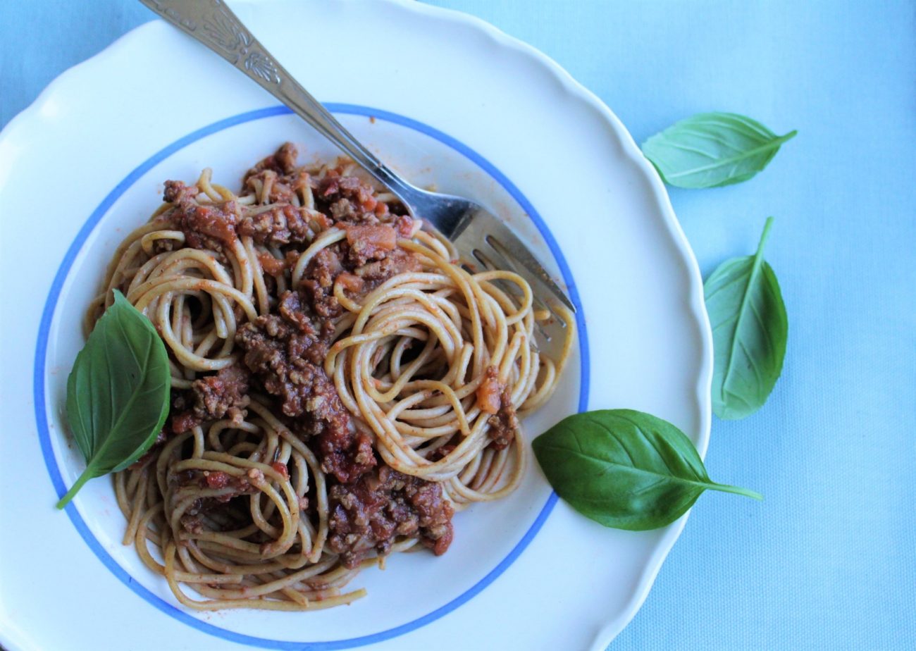 Broad bean bolognaise with spaghetti